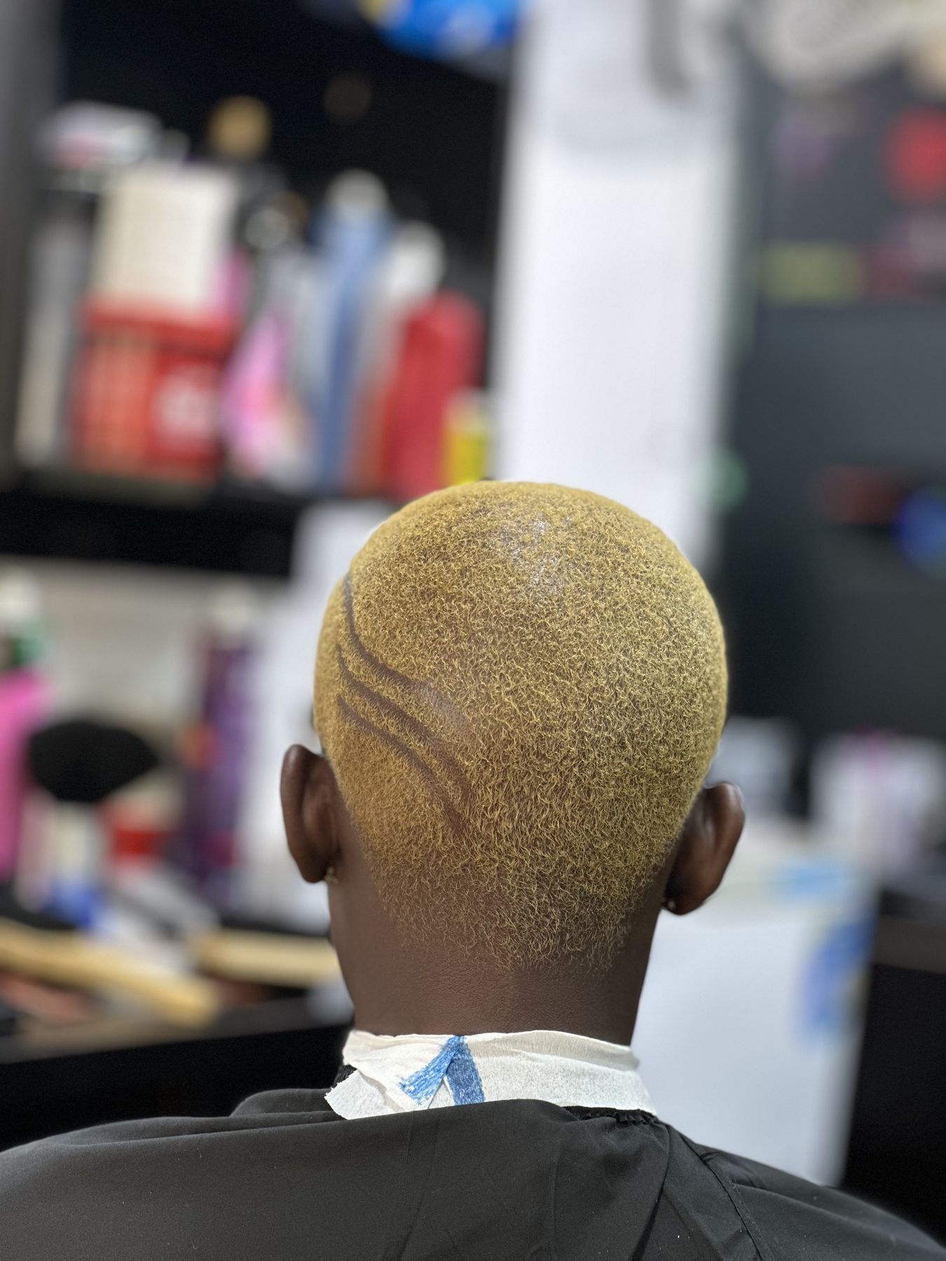 Carved design with blonde dye, Smart Cuts Bodija